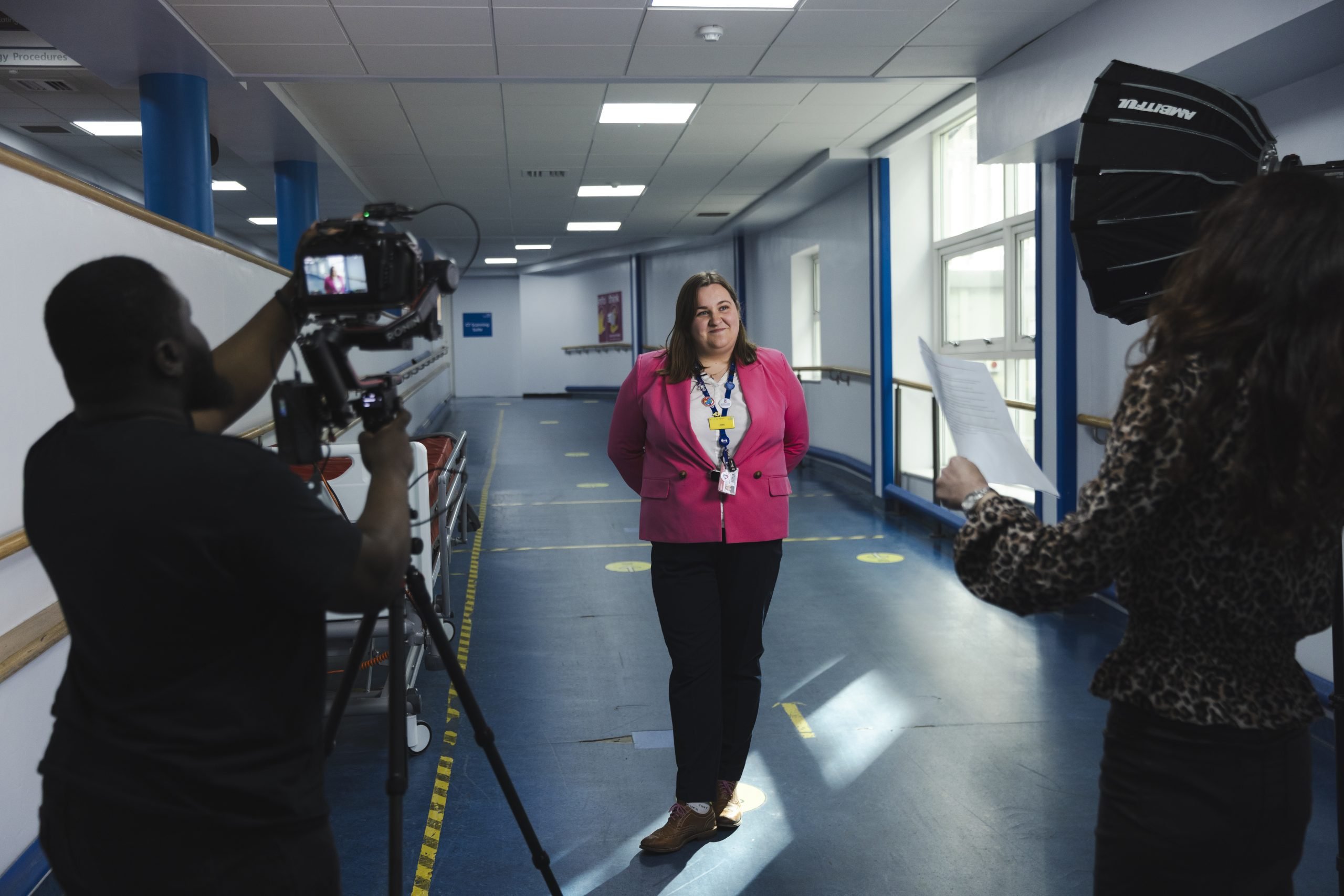 A person speaking into a microphone